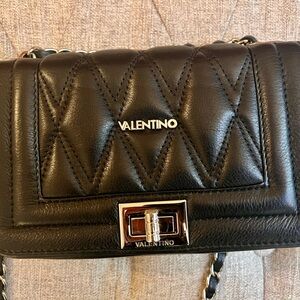 Authentic Classic Mario Valentino cross bag.